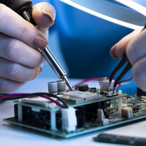 close-up-hands-working-with-tools